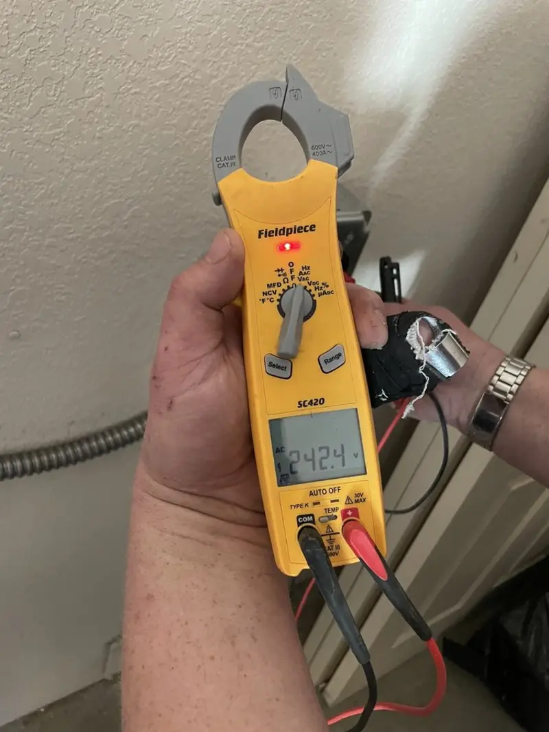 Voltage testing with clamp meter during Whole House Surge Protector in Gravette